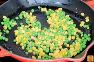 sauteing peas and corn in oil