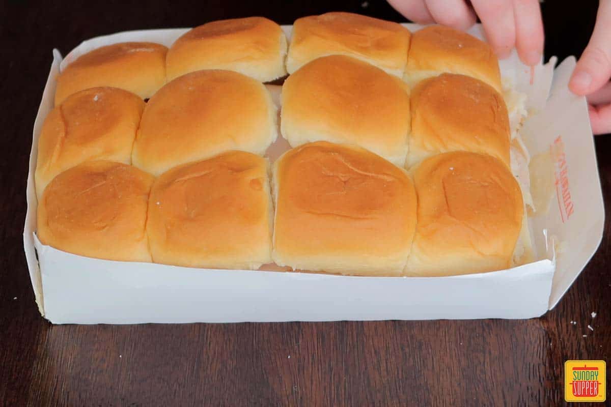 adding top of rolls back to sliders and sealing the box