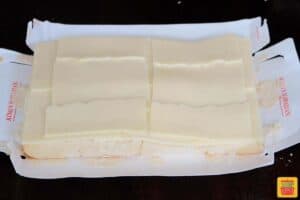layering cheese onto slider rolls