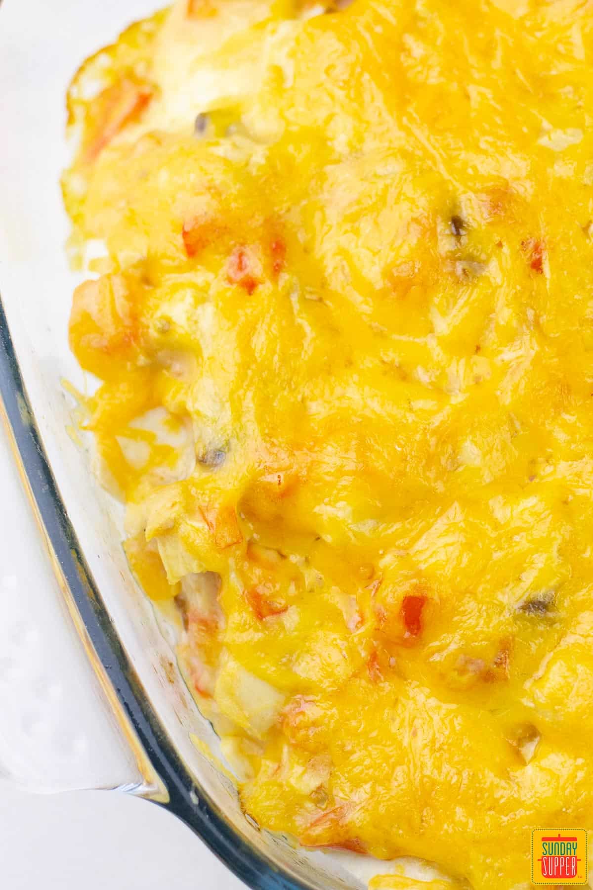 the melted cheese on top of a king ranch chicken casserole