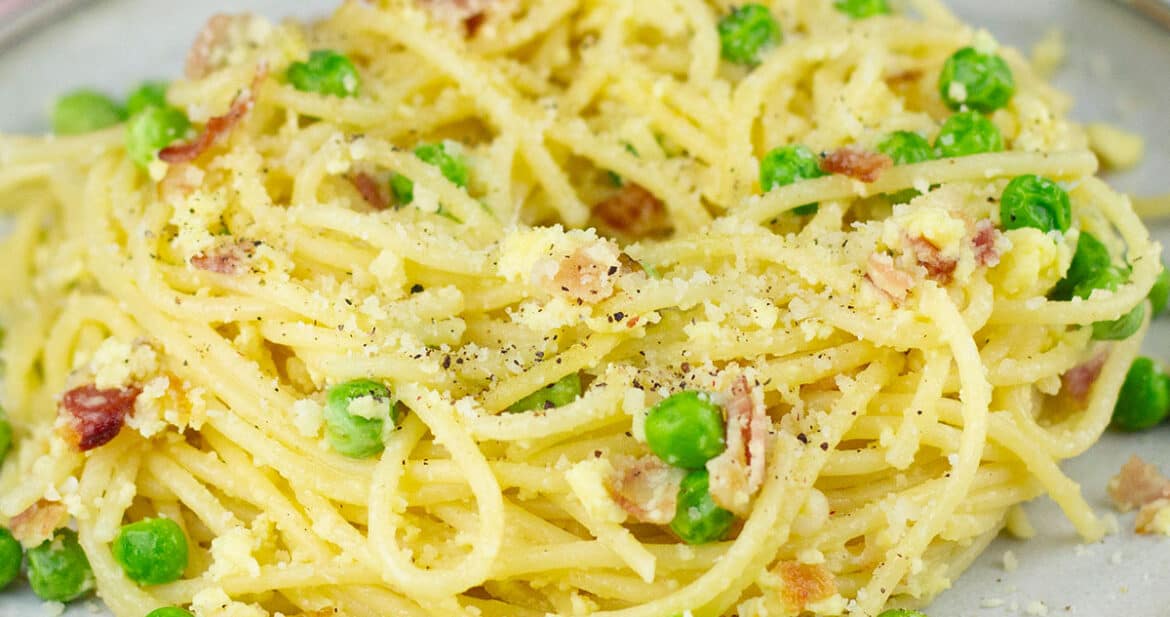 a nest of pasta carbonara on a plate
