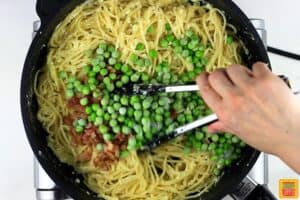 peas added into the pasta to thaw