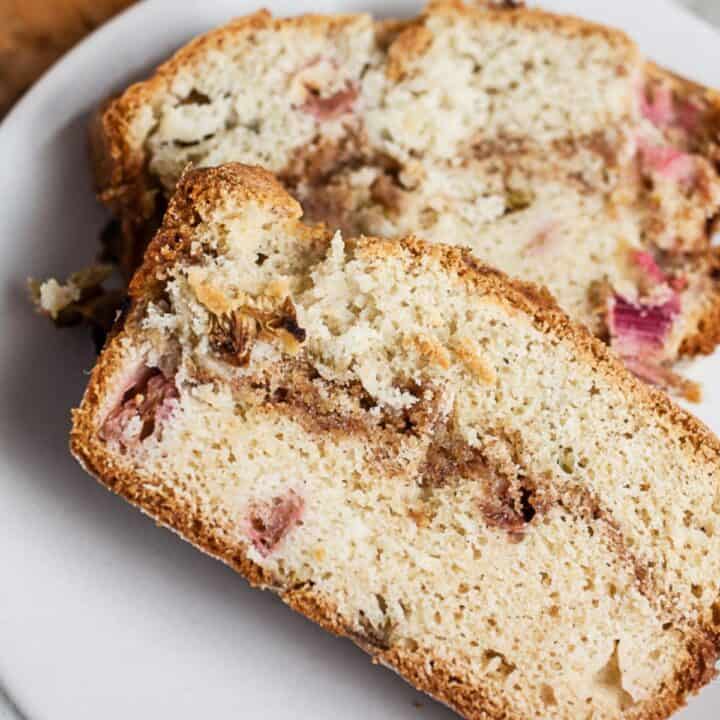two slices of rhubarb bread up close on a plate