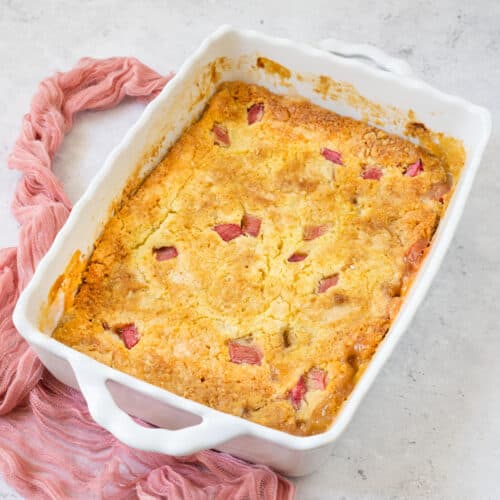 rhubarb dump cake in a white baking dish