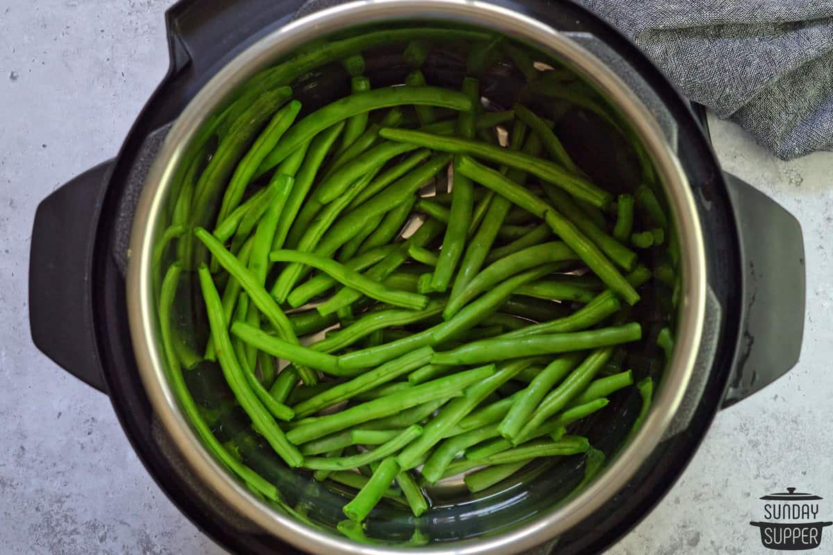 green beans in the instant pot ready to pressure cook