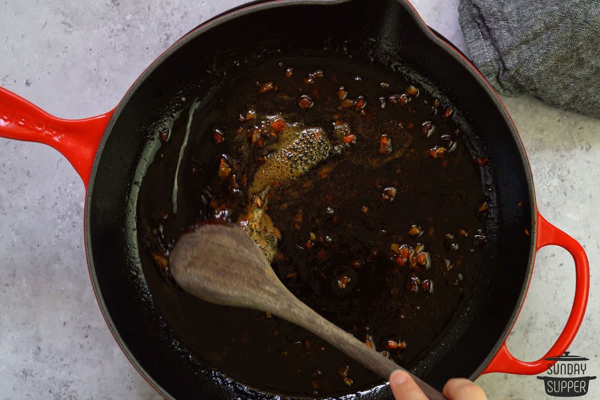 thickening honey garlic sauce in pan