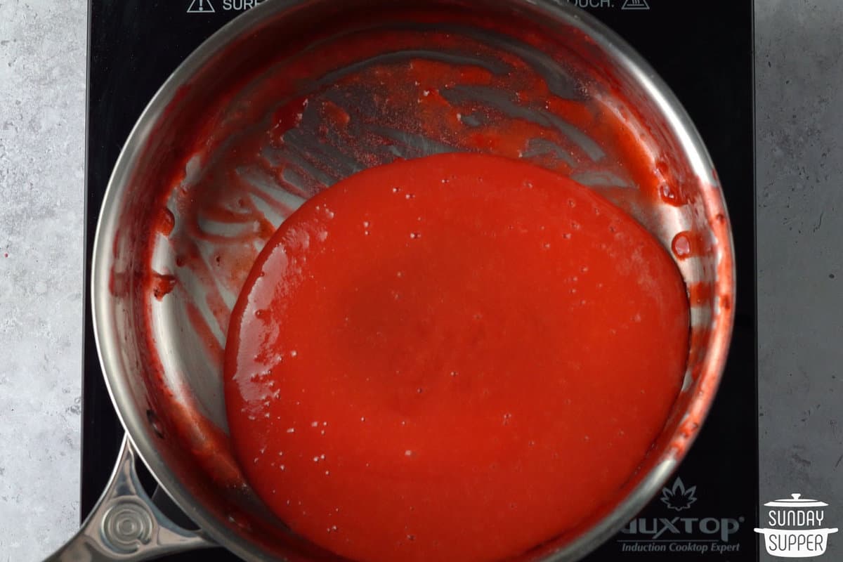 blended strawberry sauce back in saucepan