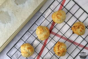 baked strawberry shortcake biscuits on a cooling rack