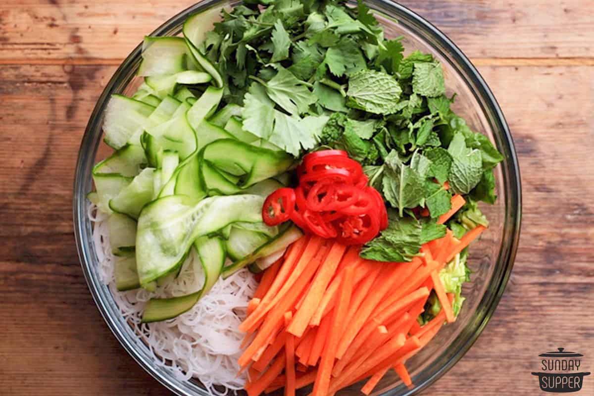 Vietnamese beef salad ingredients in a bowl before mixing