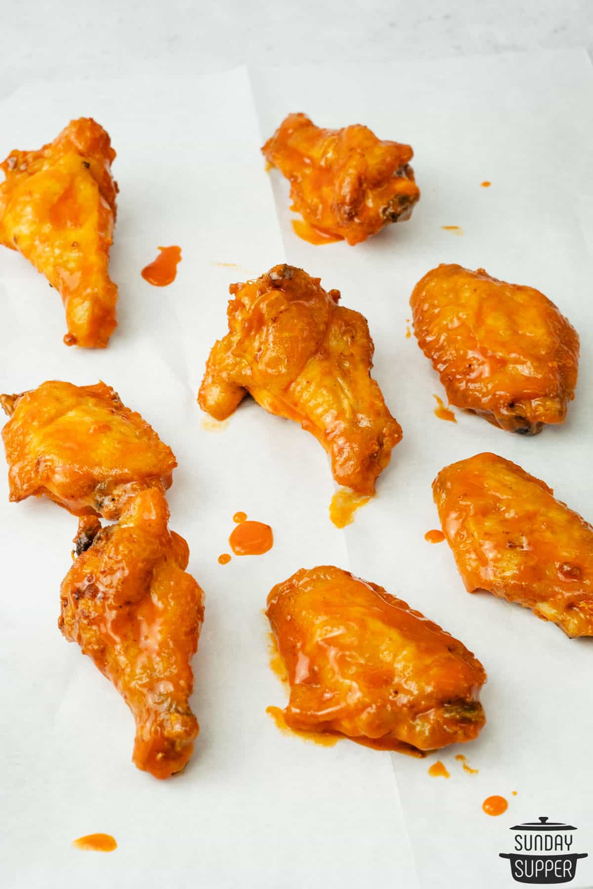 buffalo chicken wings on a white table