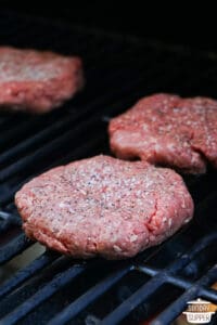 the wagyu burgers on the grill