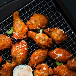 buffalo chicken wings on a cooling rack