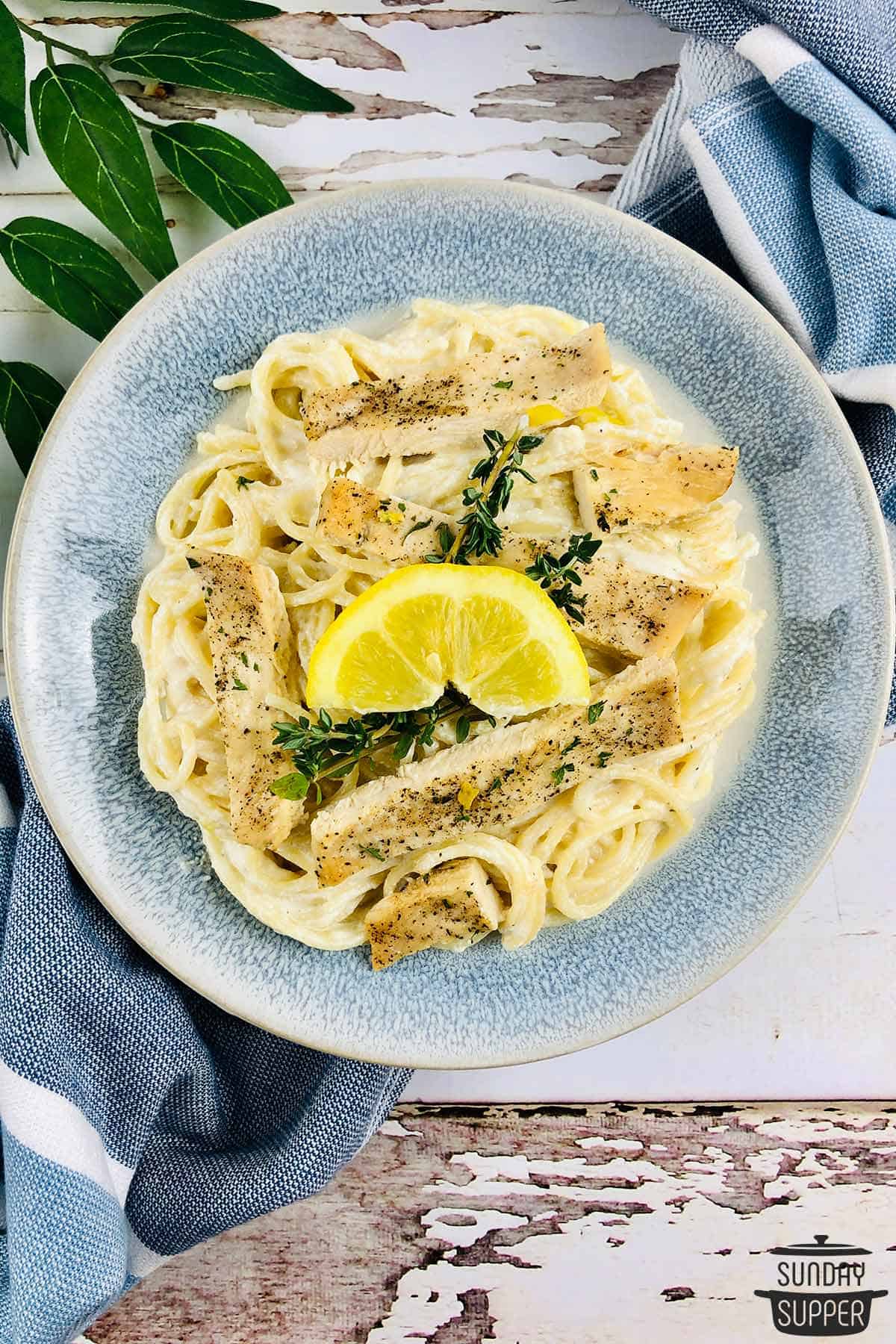 a serving dish of chicken pasta with lemon ricotta sauce
