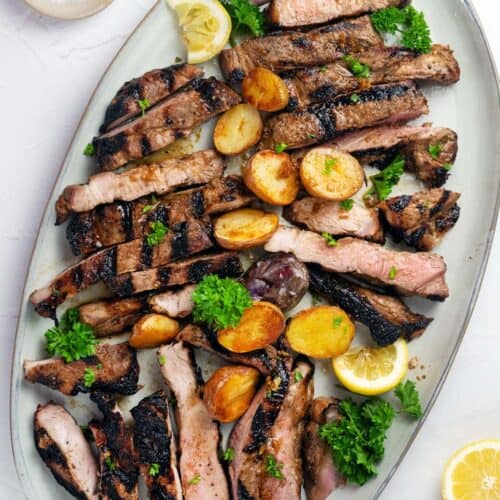 https://sundaysuppermovement.com/wp-content/uploads/2023/08/grilled-pork-steak-hero-500x500.jpg