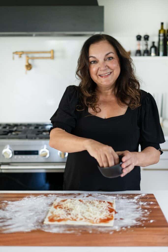 Isabel making pizza twists