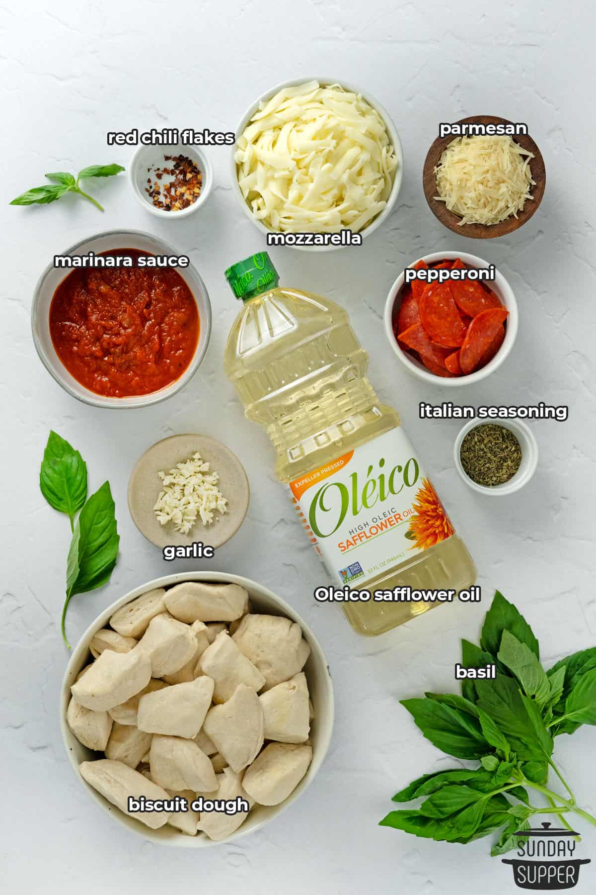ingredients to make pizza monkey bread with labels
