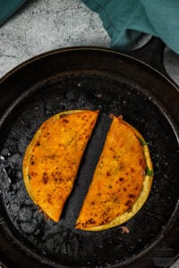 pan-fried quesabirria tacos in a skillet