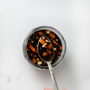 teriyaki sauce with a spoon in a jar