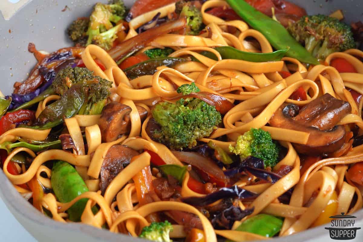 teriyaki noodle stir-fry in a bowl up close