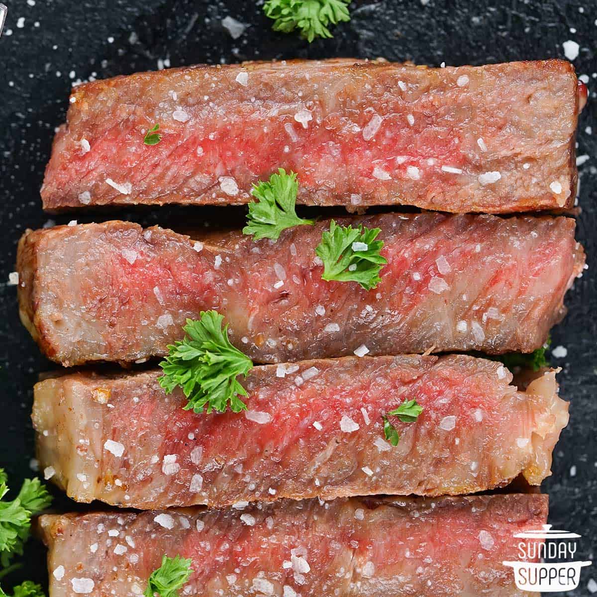 slices of wagyu steak seasoned with salt