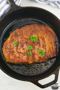 wagyu steak seared in a cast iron pan