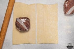 adding beef wellington to center of puff pastry