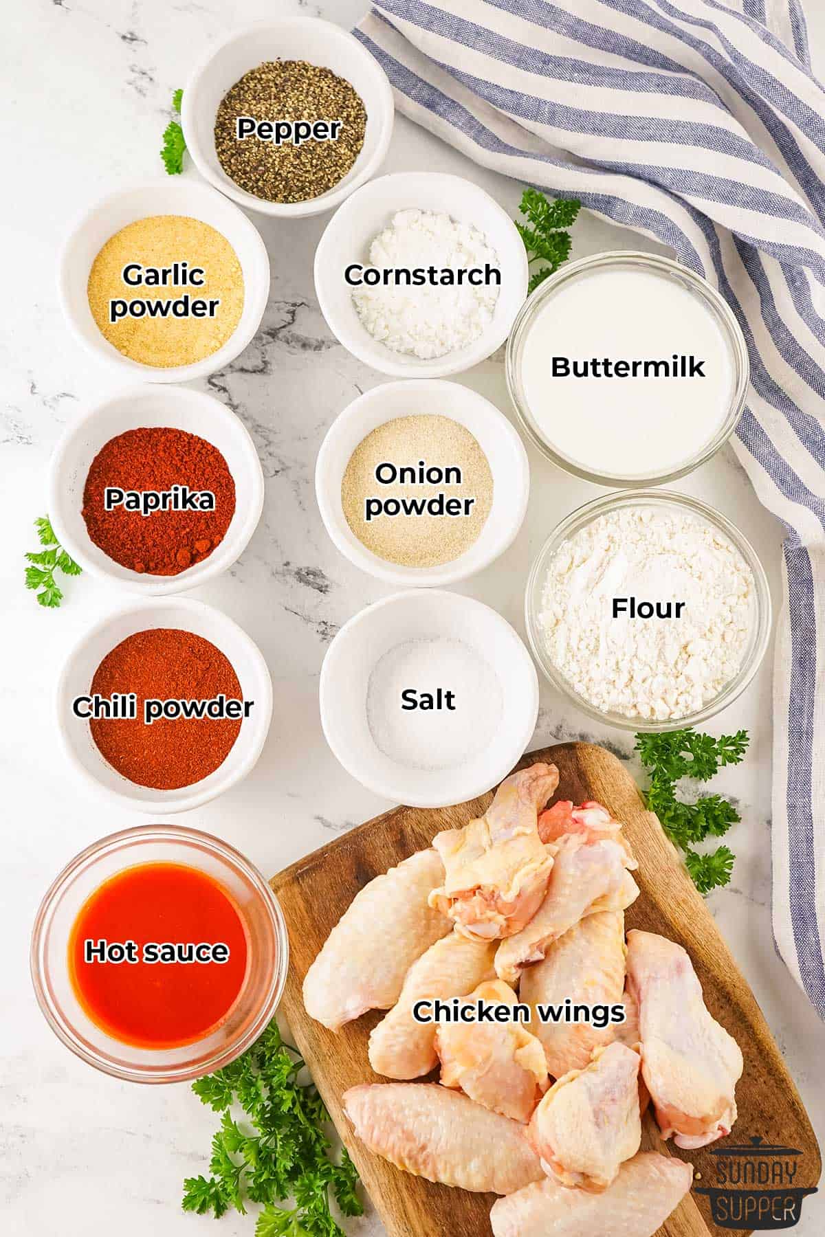 all the ingredients for fried chicken wings with labels