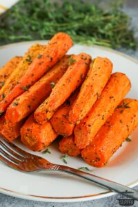 completed air fried carrots on a cutting board