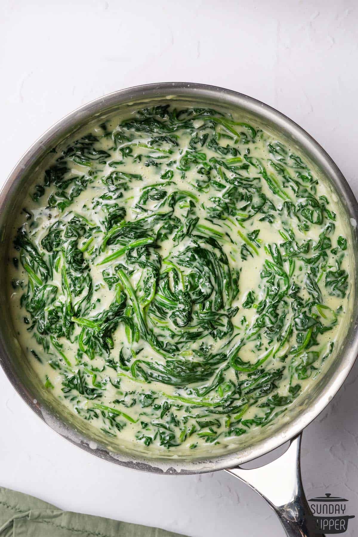 a pan of creamed spinach