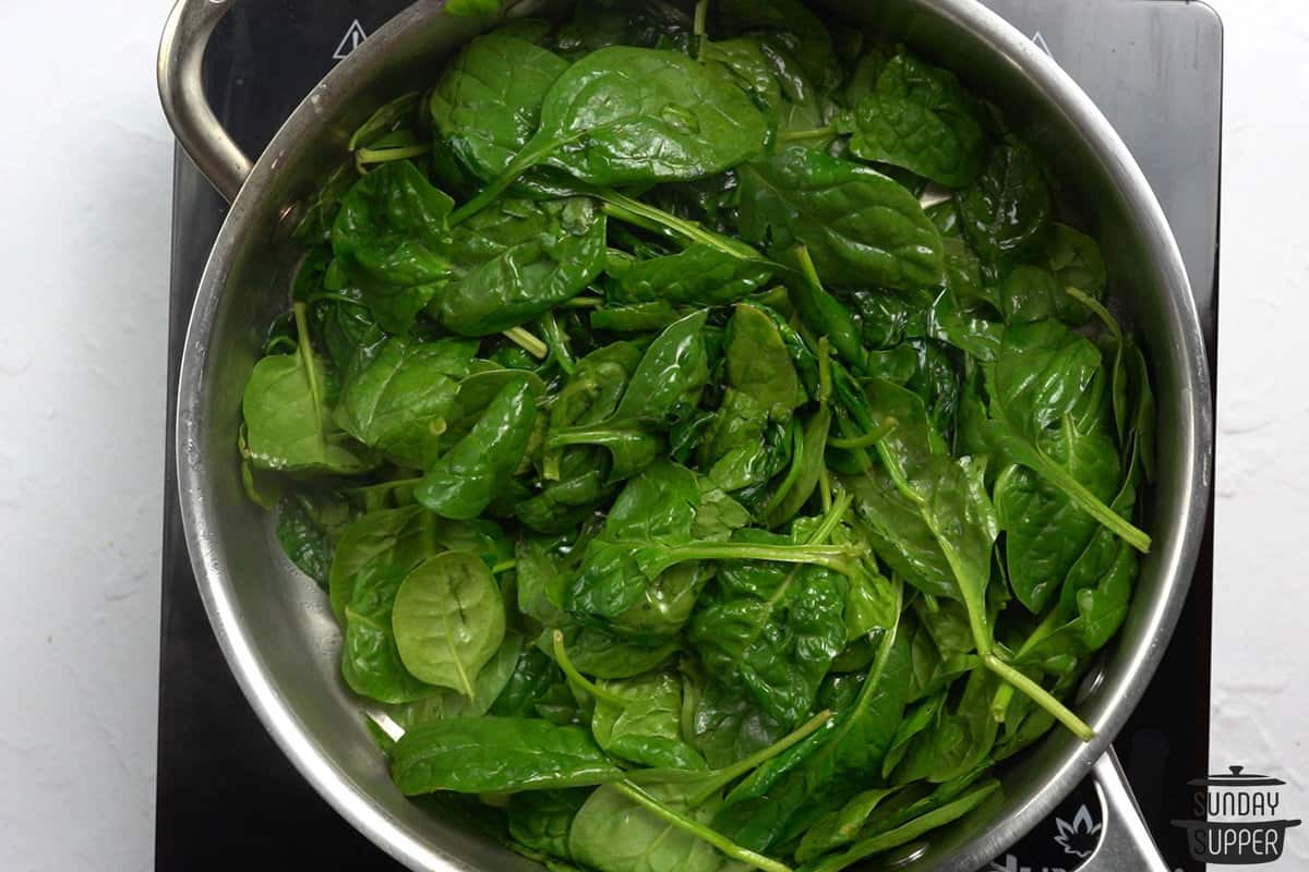spinach cooking in a pot