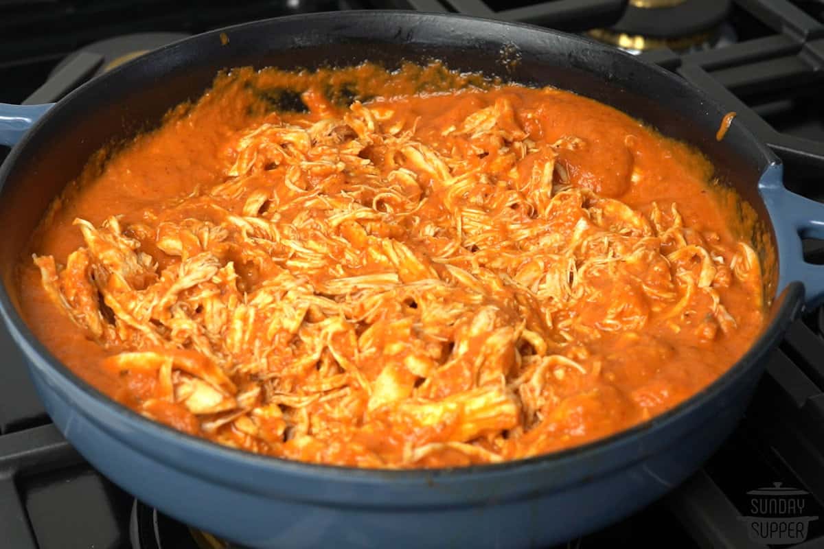 the shredded chicken mixed into the sauce