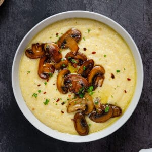 creamy polenta with a topping of sauteed mushrooms