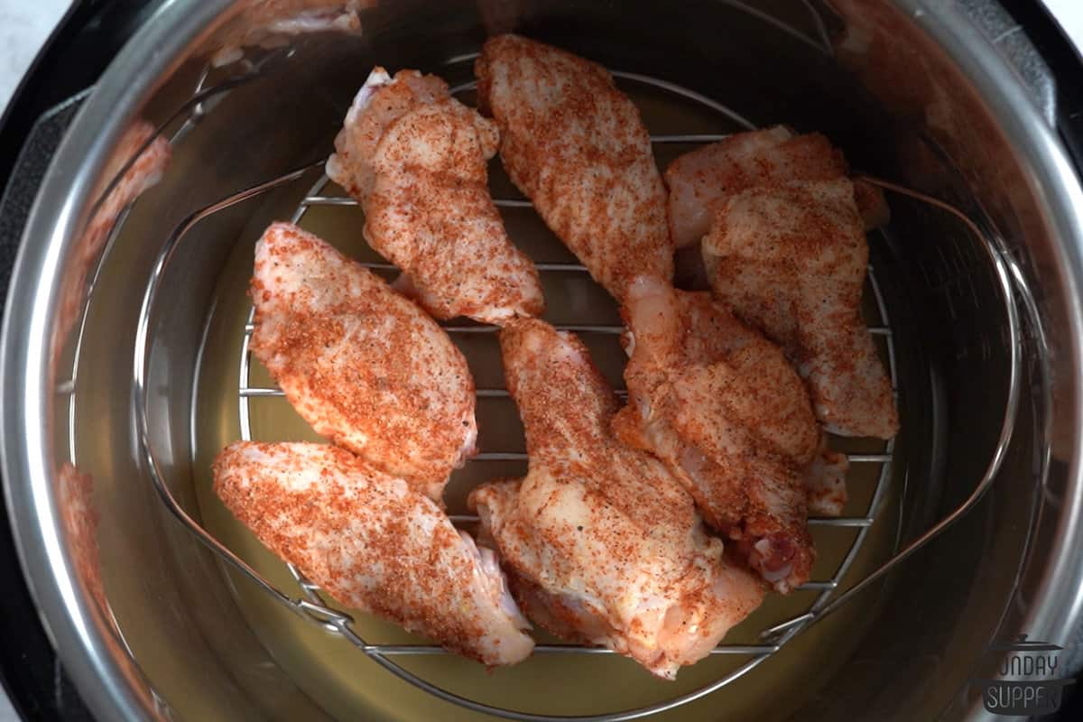 Seasoned chicken wings on instant pot trivet