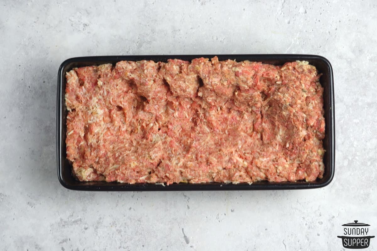 the meatloaf formed in a loaf pan