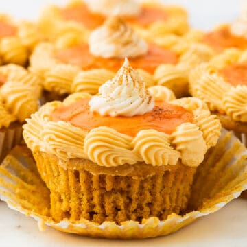 close up of pumpkin spice cupcakes unwrapped