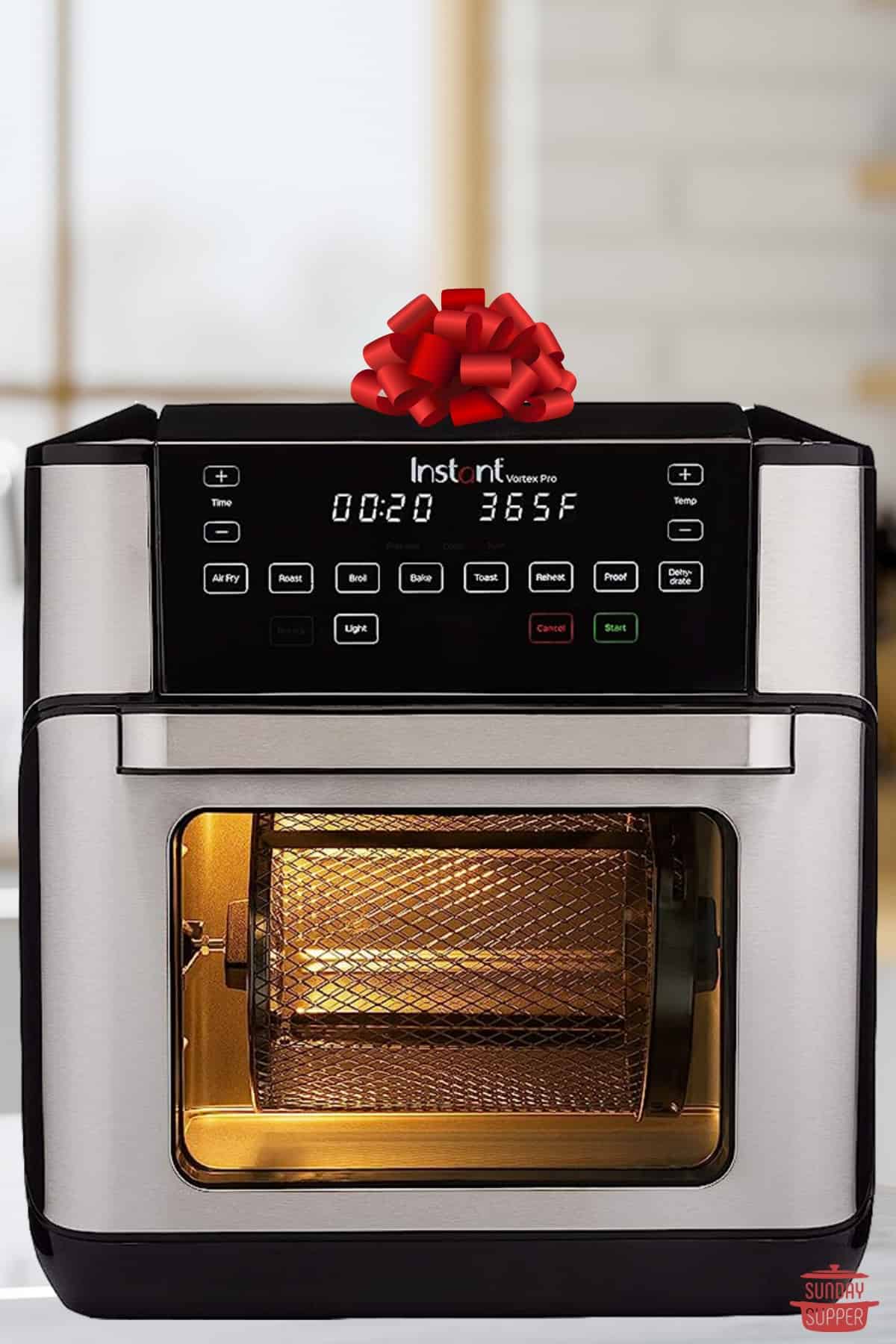 an instant vortex pro air fryer with a gift bow