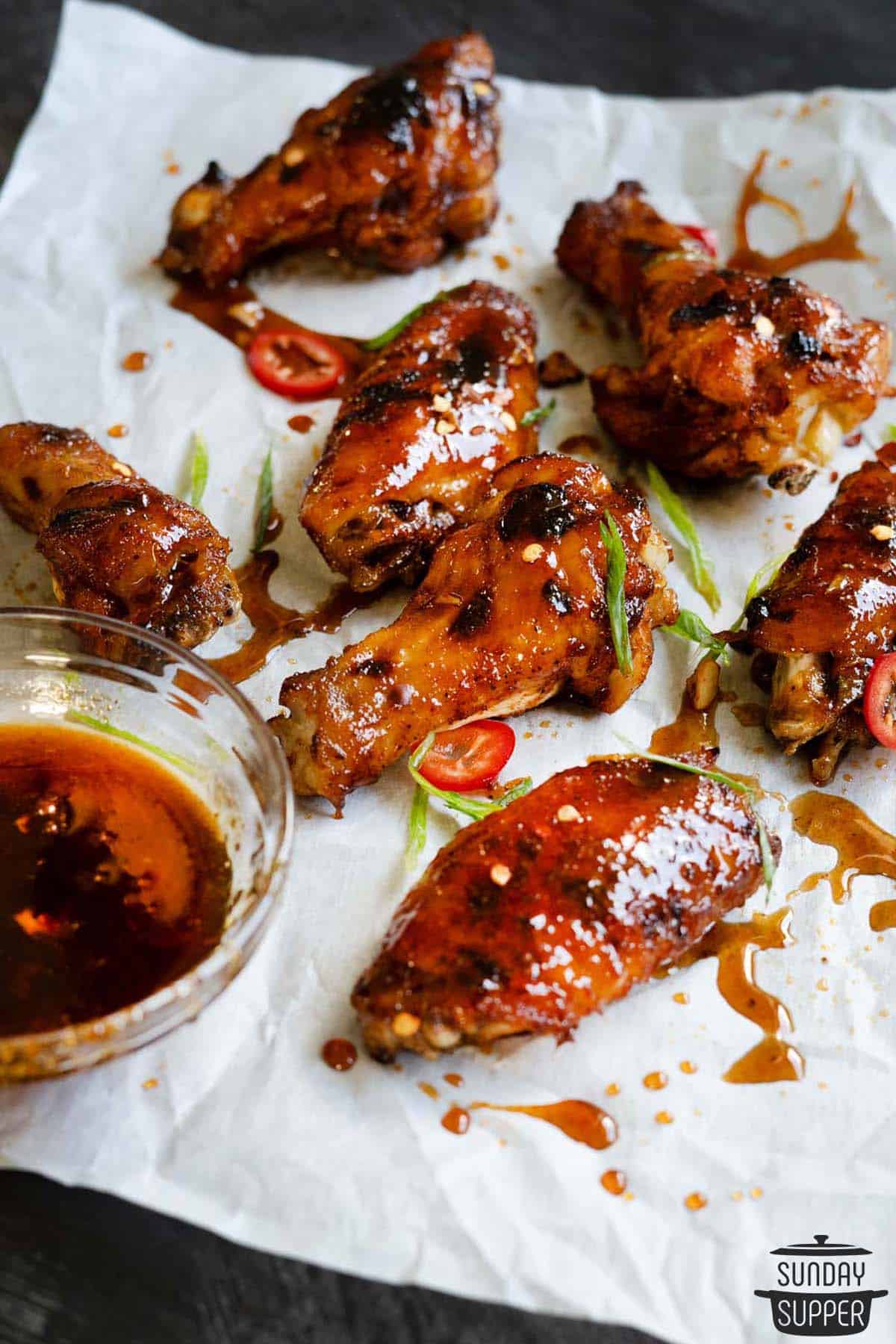 chicken wings and drumsticks with honey sriracha sauce