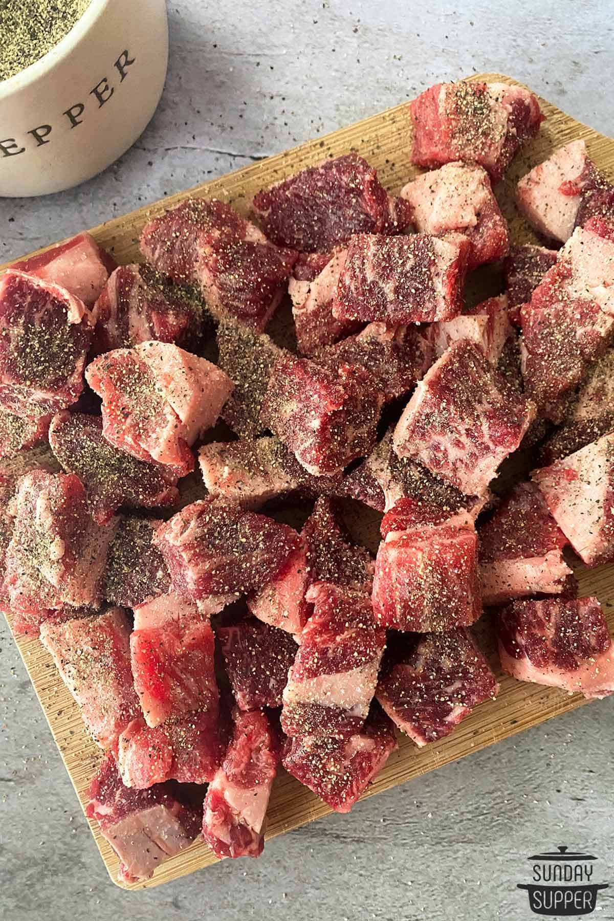 the sliced short ribs seasoned with salt and pepper