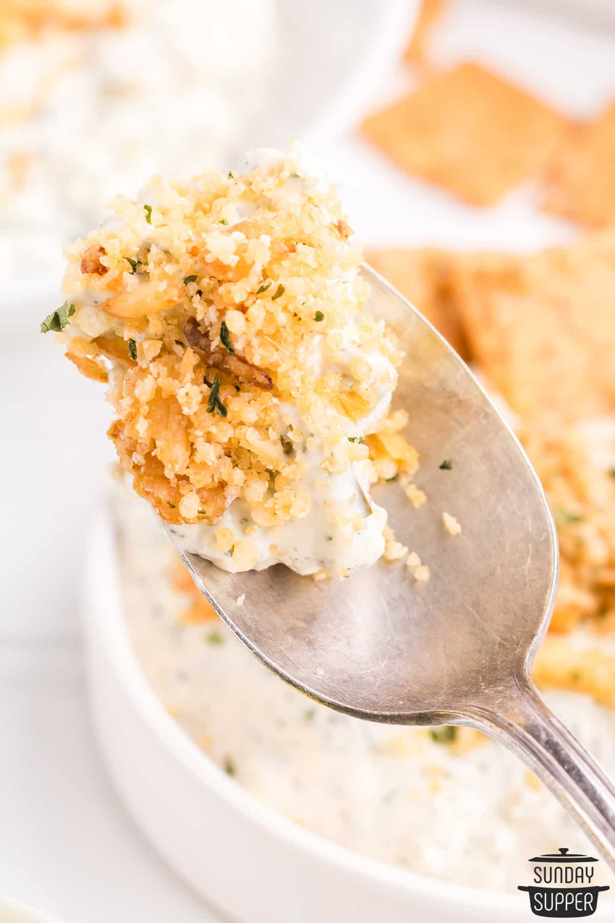 fried pickle dip on a spoon