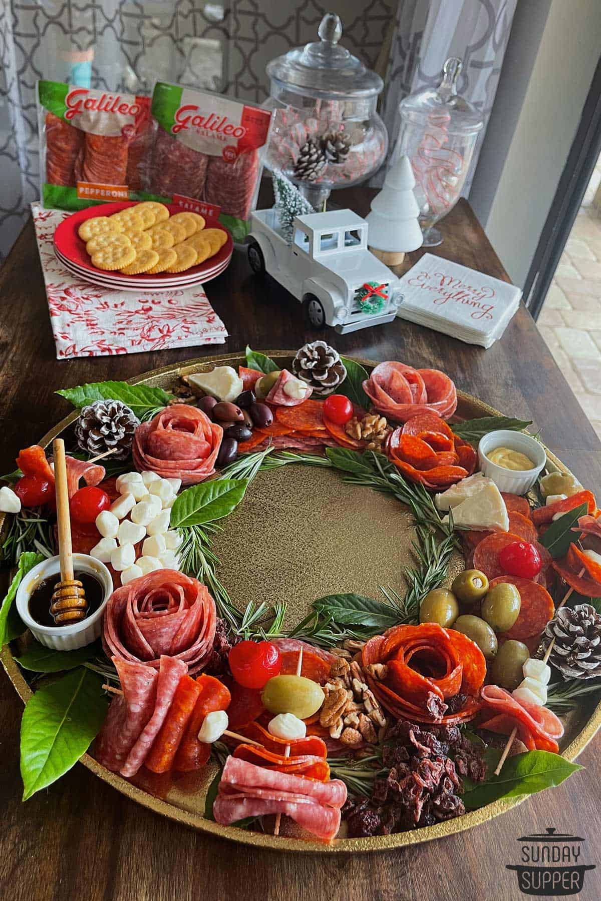 a charcuterie wreath with meat flowers