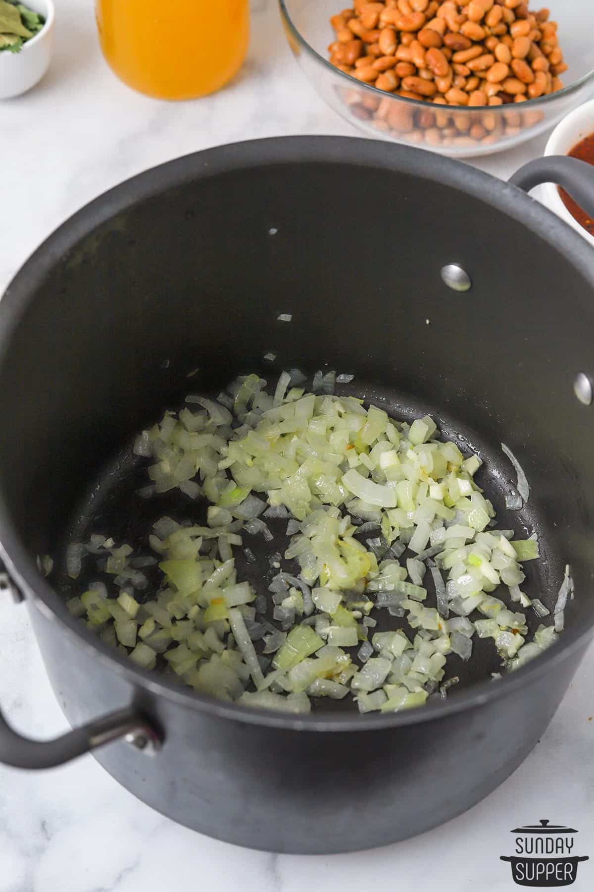 the onions and garlic browning in a pot