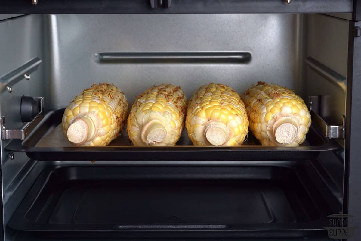 the corn in an air fryer tray