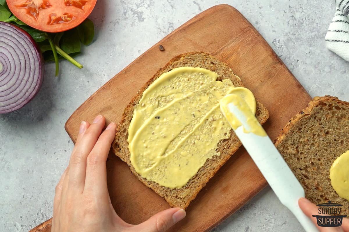 the honey mustard spread on a slice of bread