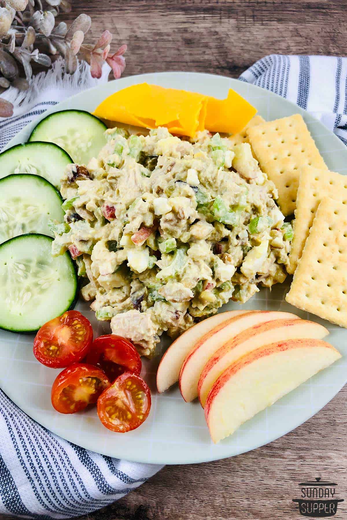 a plate of tuna salad with extra sides for dipping