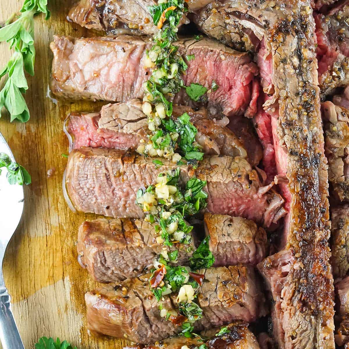 argentine chimichurri on a sliced steak