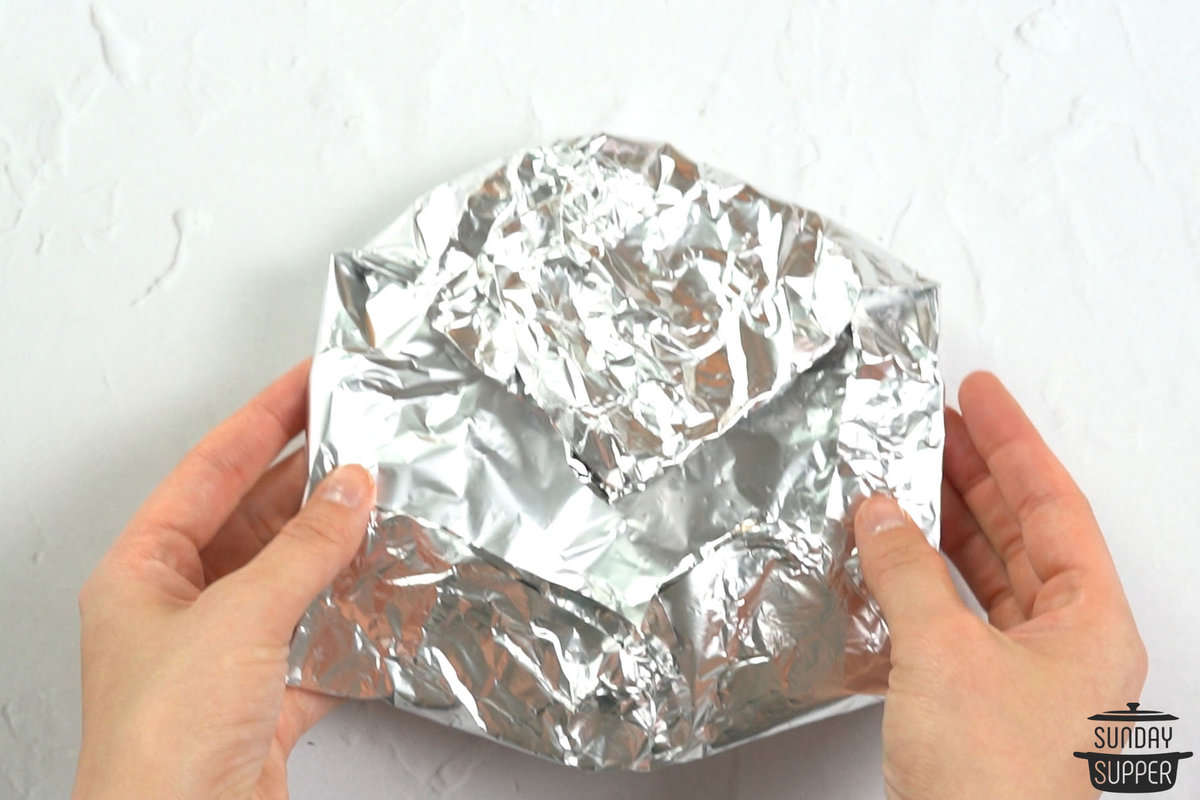a stack of tortillas wrapped in foil