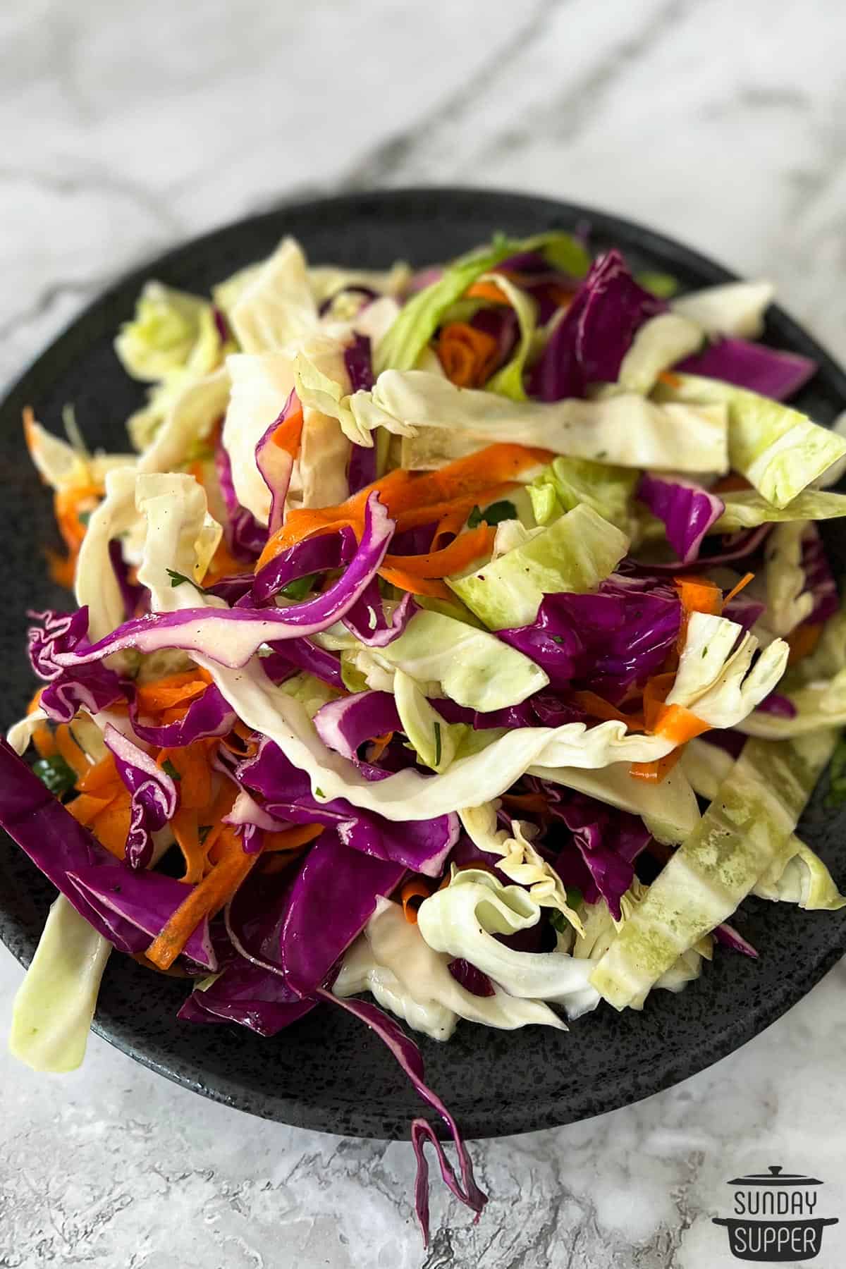 a plate of asian coleslaw