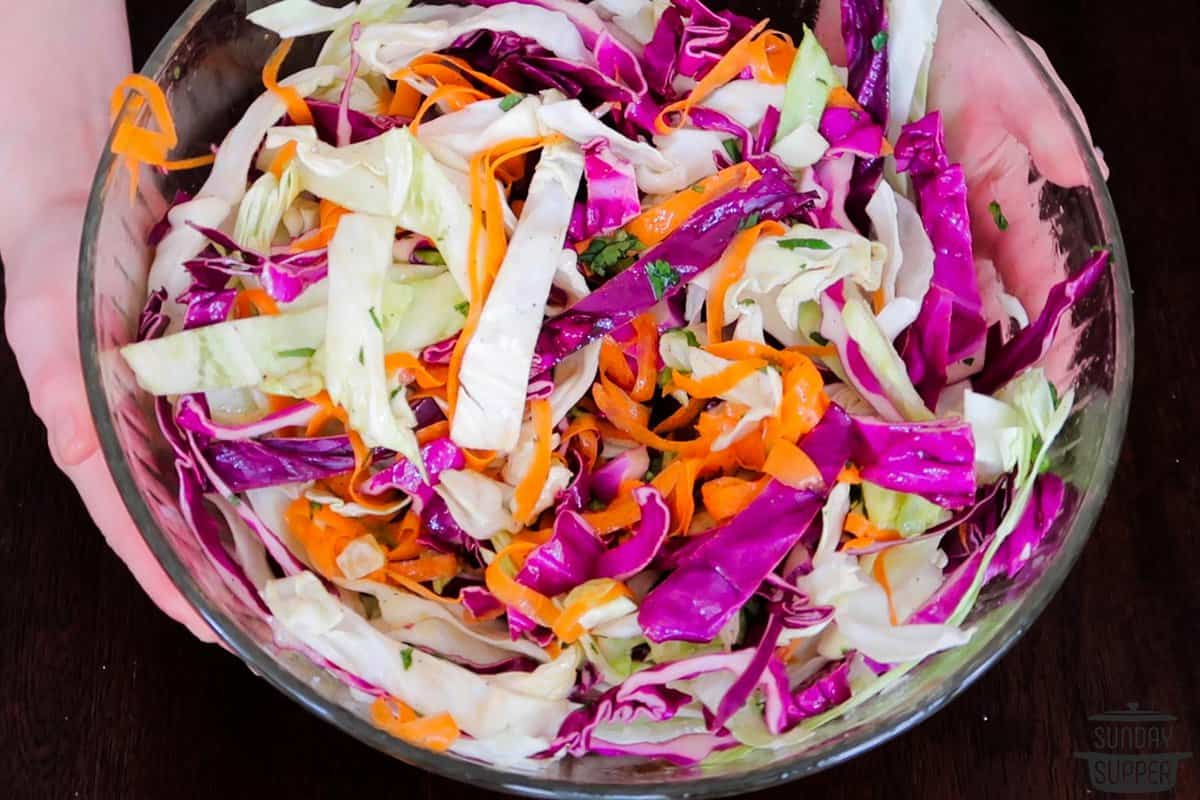 the coleslaw combined in a bowl