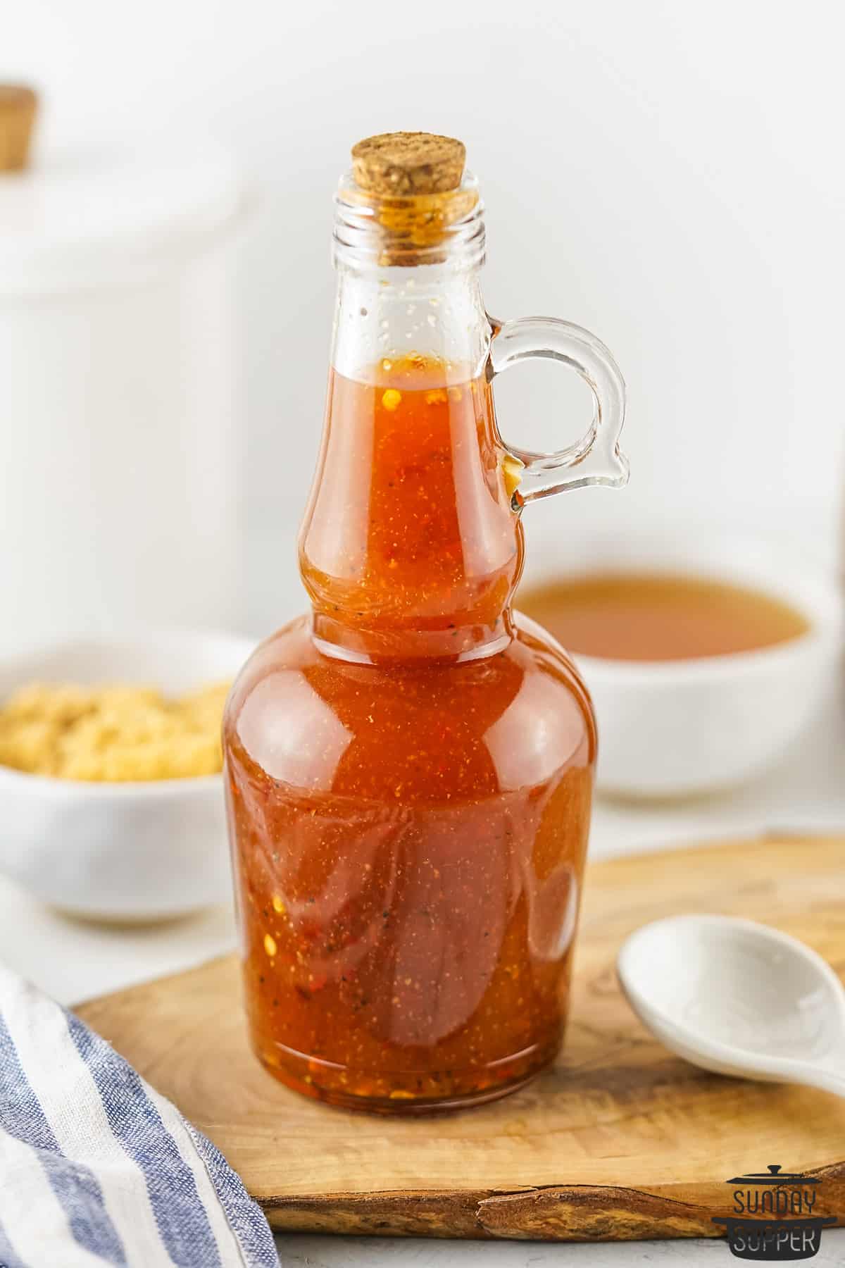a glass jar filled with Carolina BBQ sauce