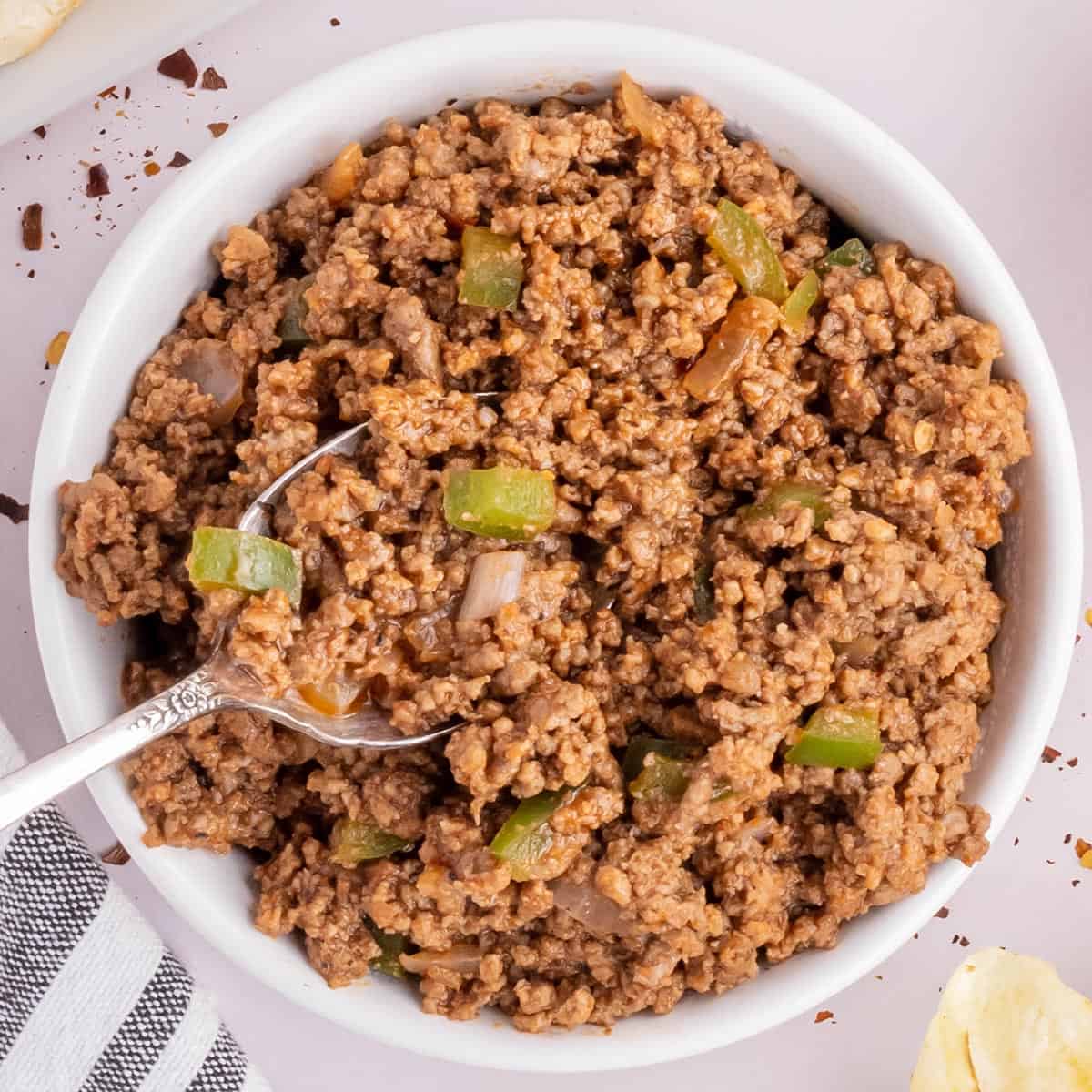 a bowl filled with sloppy joe meat